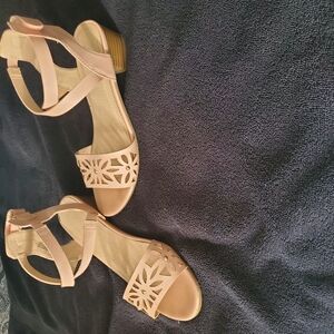 Pastel Pink Girl Sandals with Adjustable Ankle Straps and Decorative Cut-Outs